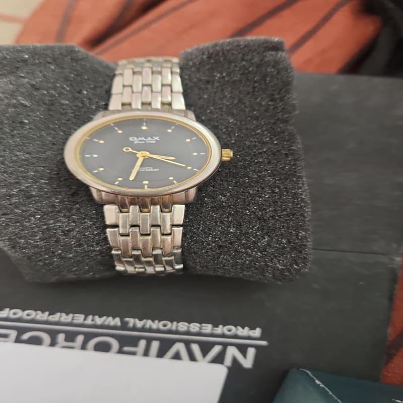 Omax Two-Tone Analog Watch for Women Grey Dial